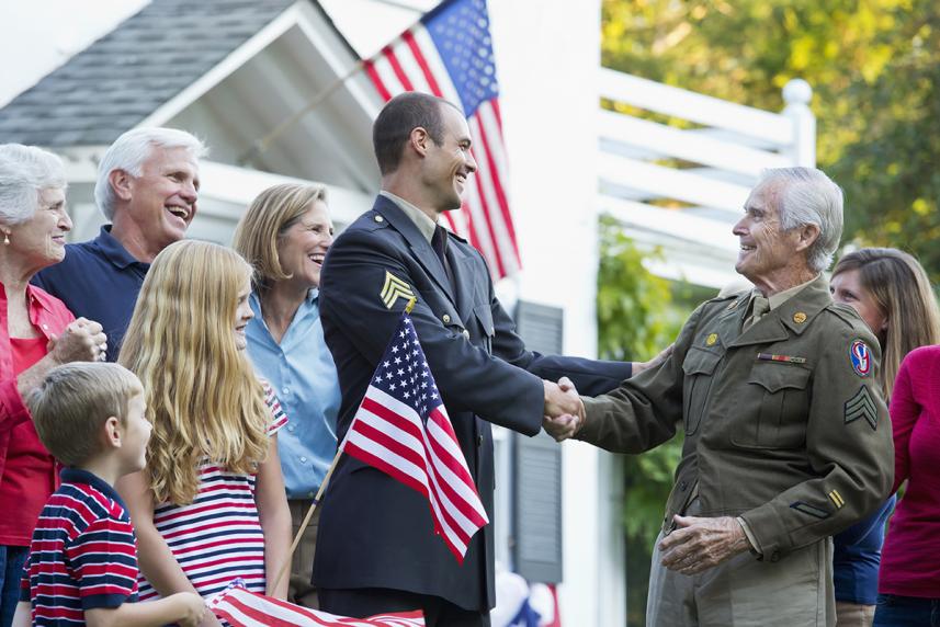 Photo of Military personnel shaking hands